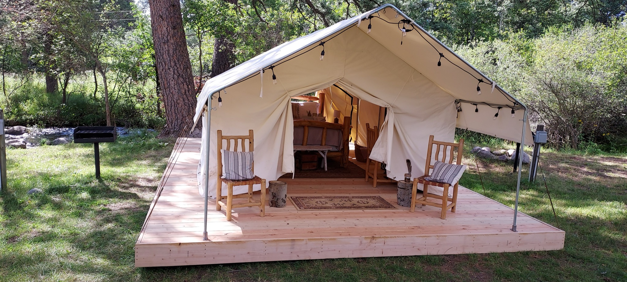 A wall tent ready for guests